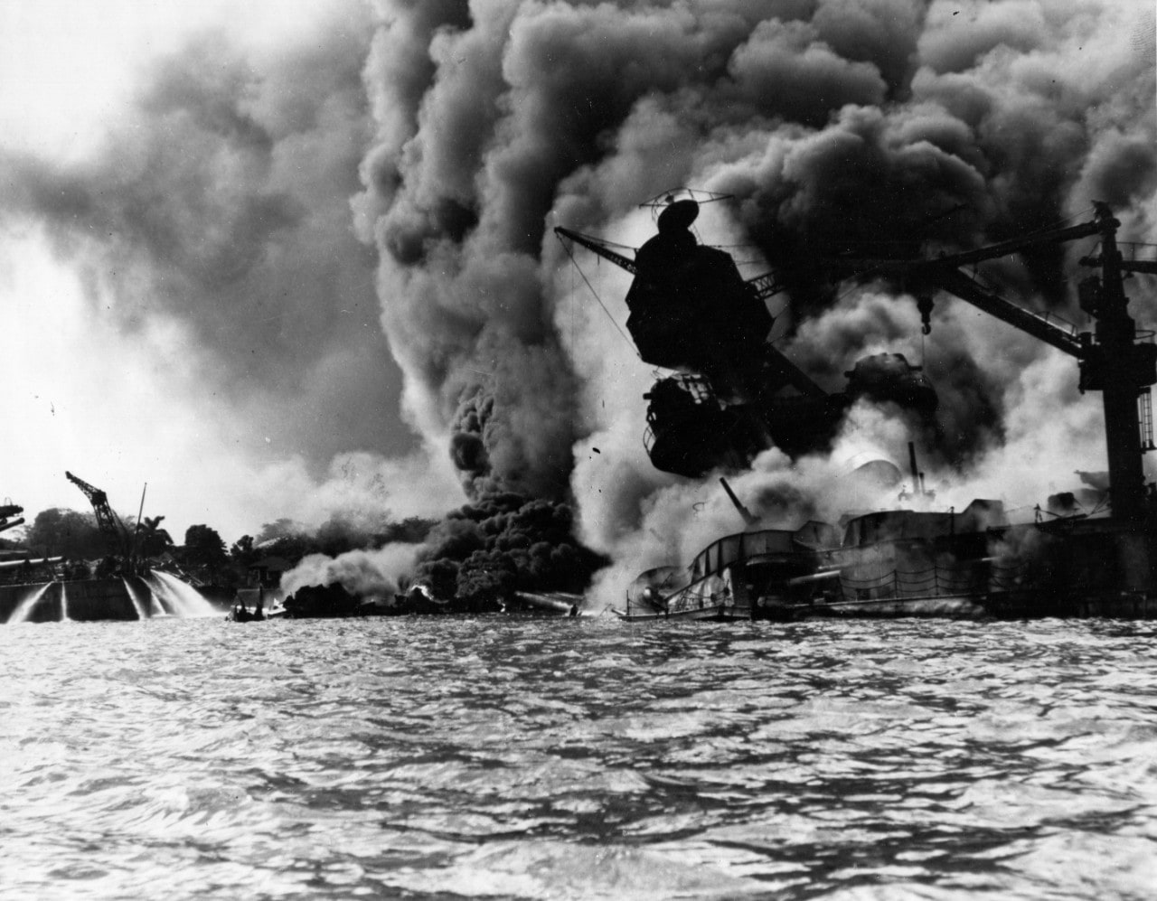 USS Arizona burning