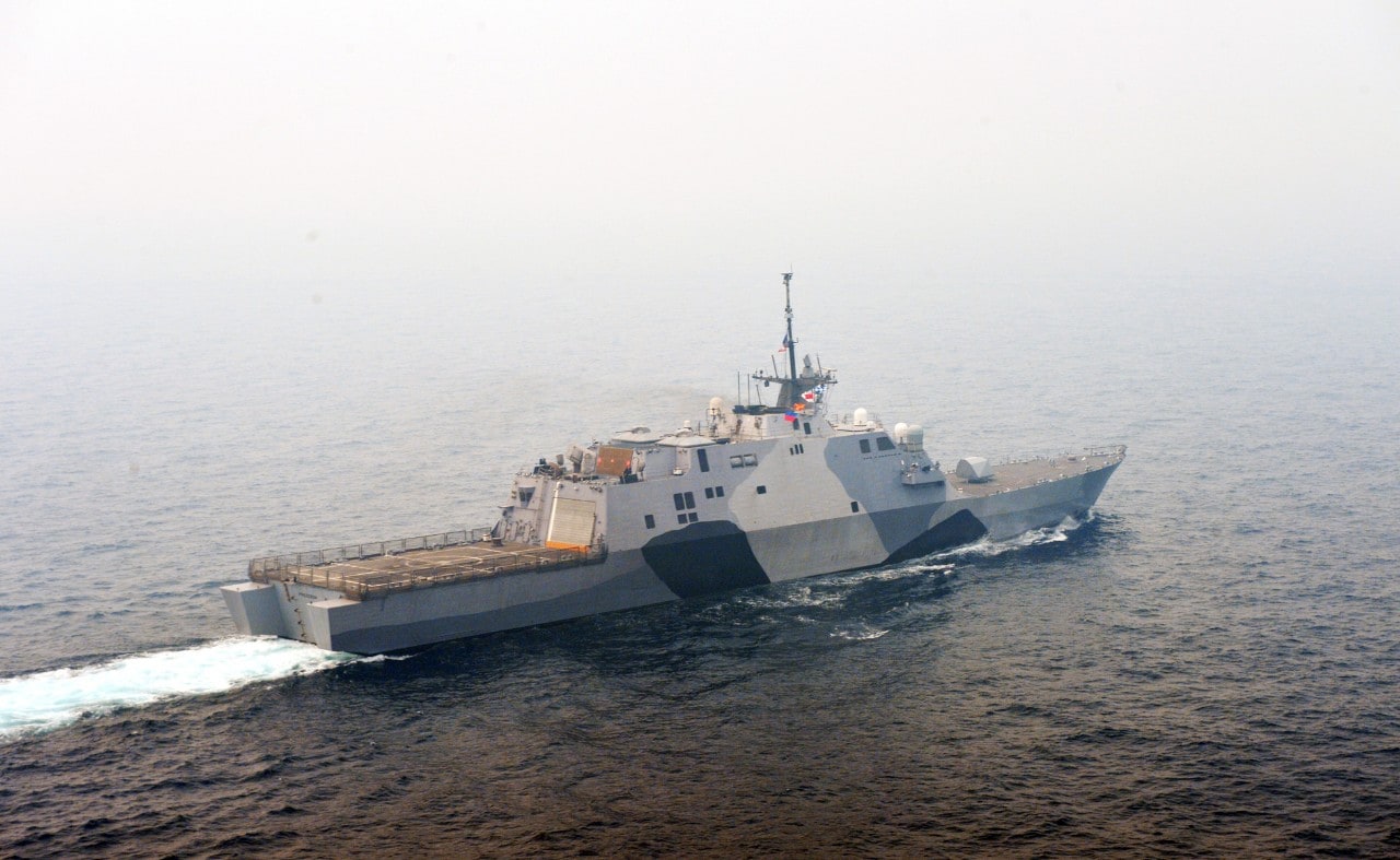 The littoral combat ship USS Freedom (LCS 1) transits the South China Sea during a photo exercise with other US navy ships.