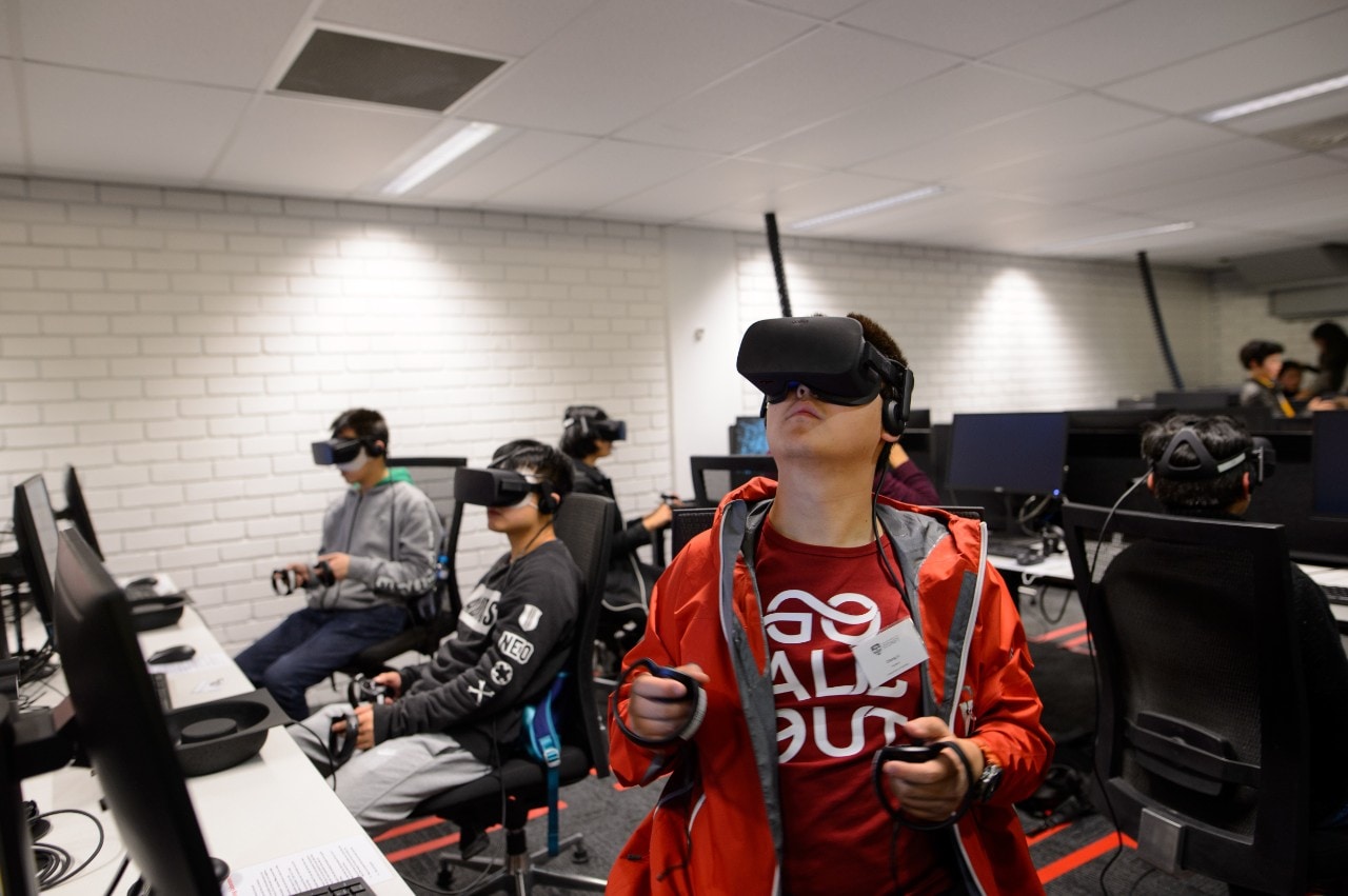 A student using an Oculus Rift headset in the new Immersive Learning Laboratory.