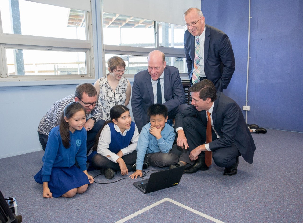 (L-R): Australian Computing Academy Academic Director Associate Professor James Curran, ACA's Dr Nicky Ringland, Trent Zimmerman MP, Federal Member for North Sydney, University of Sydney Vice-Chancellor and Principal Dr Michael Spence and Minister for Education and Training, Senator the Hon Simon Birmingham and with Year 5 students from Artarmon Public School.