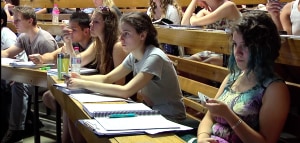 Students using response devices in a first year chemistry lecture