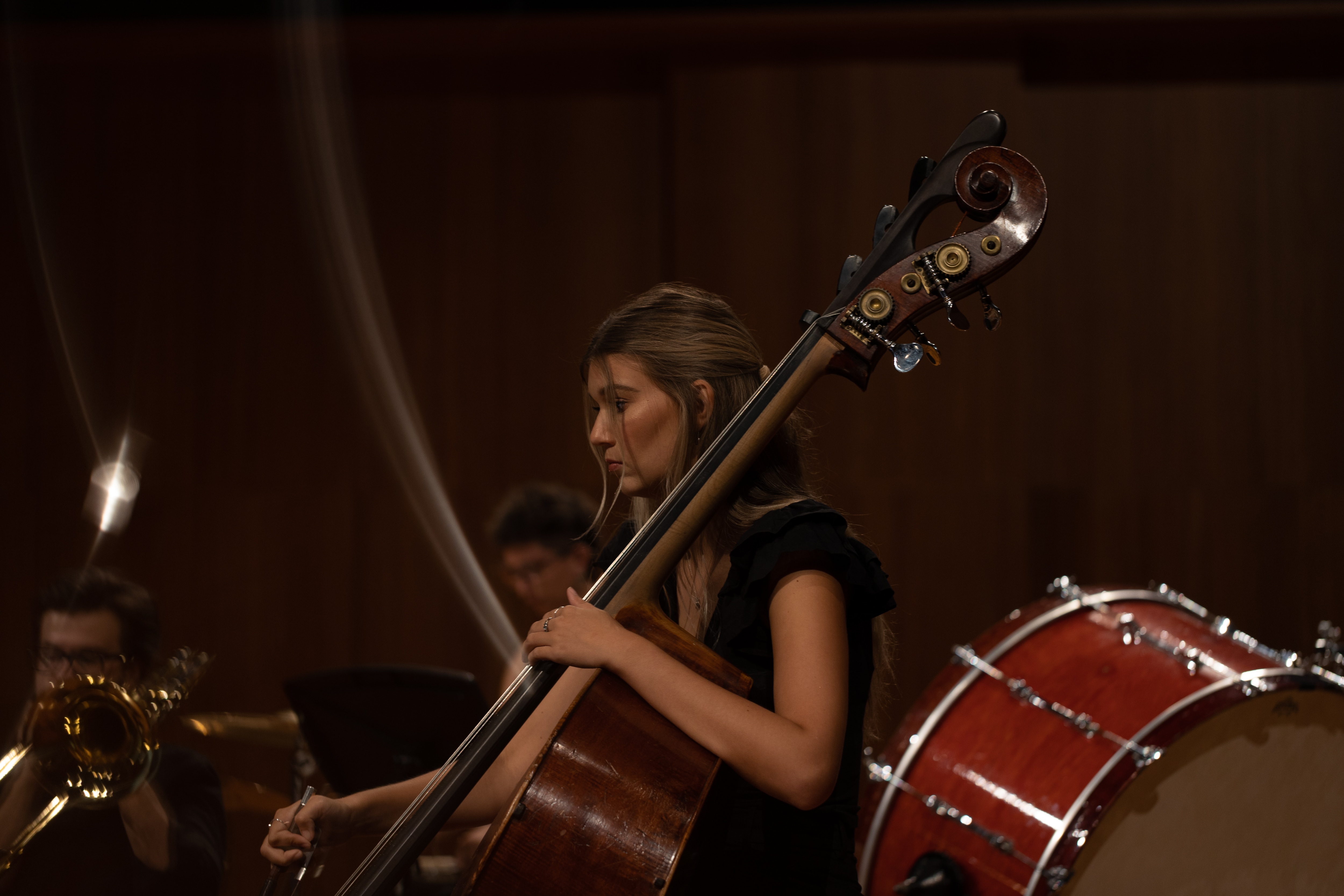 Female double bass player at rehearsal