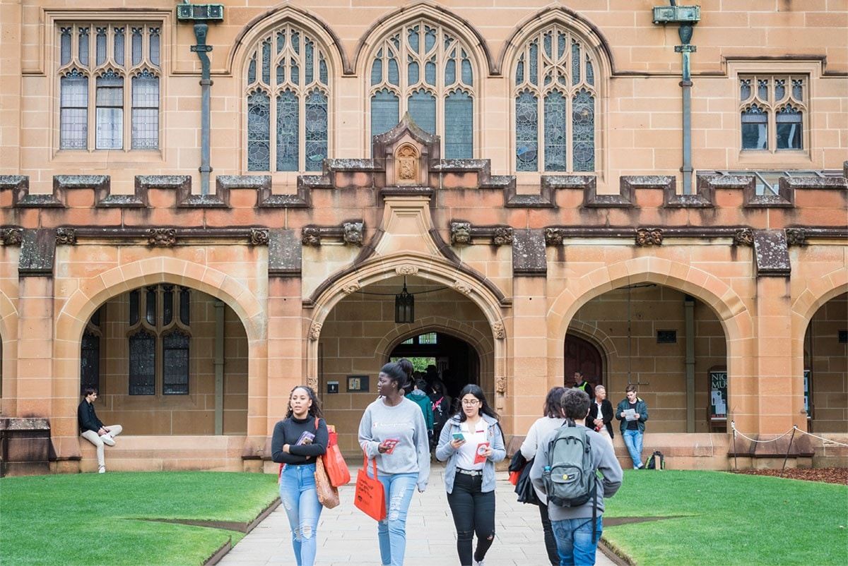 Students walking in front of Quad at Info Day