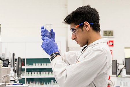 pharmacy student performing an experiment