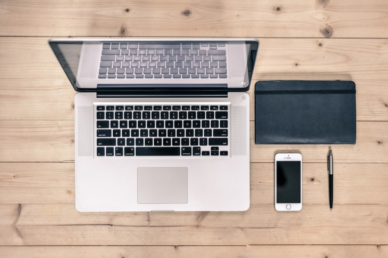 A neat desk with a laptop