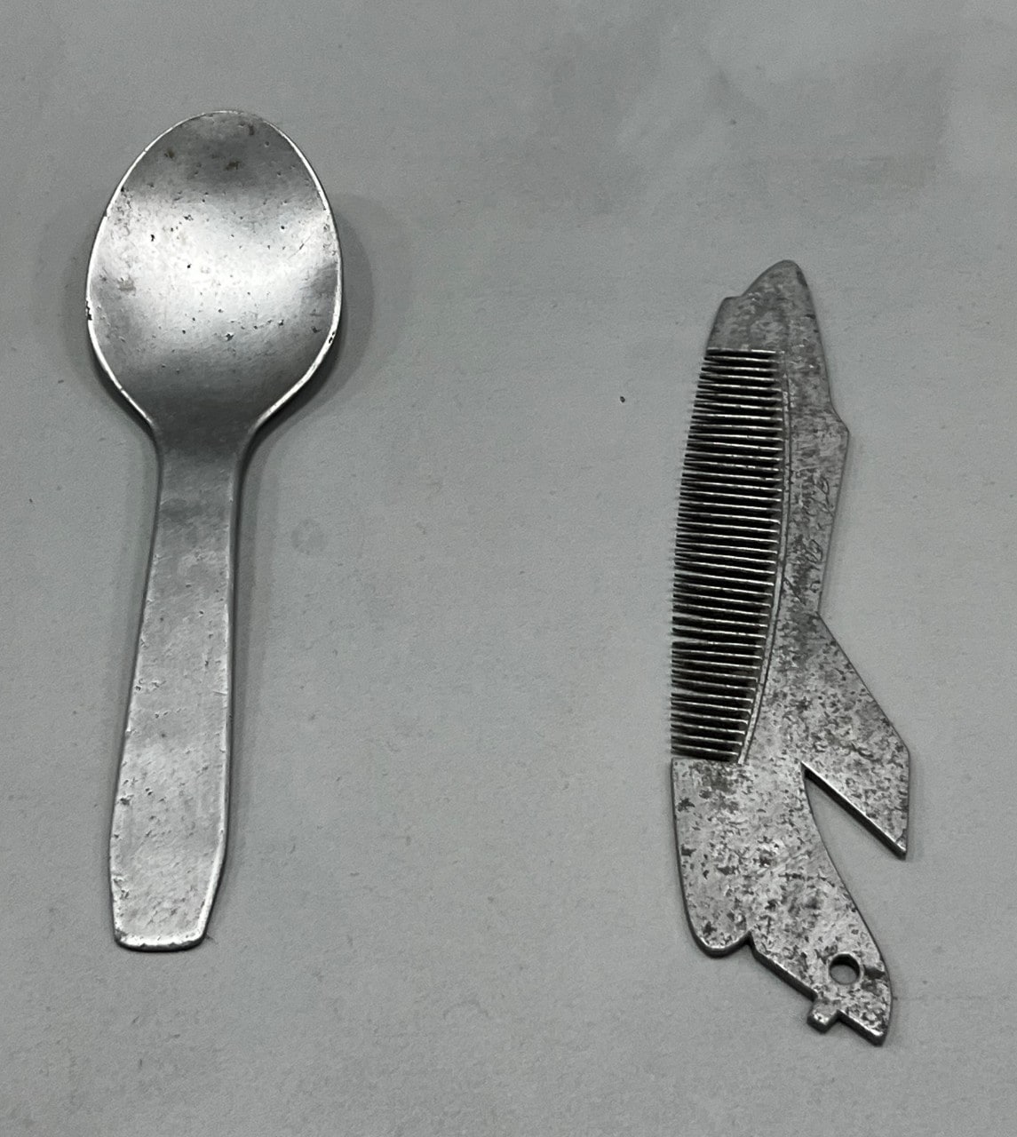 Comb and spoon made out of napalm shells