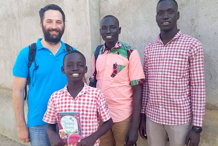 Kevin Lenahan in front of South Sudan Library