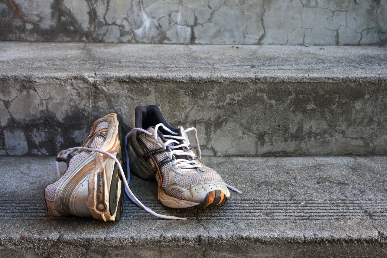 Old running shoes on the steps. 
