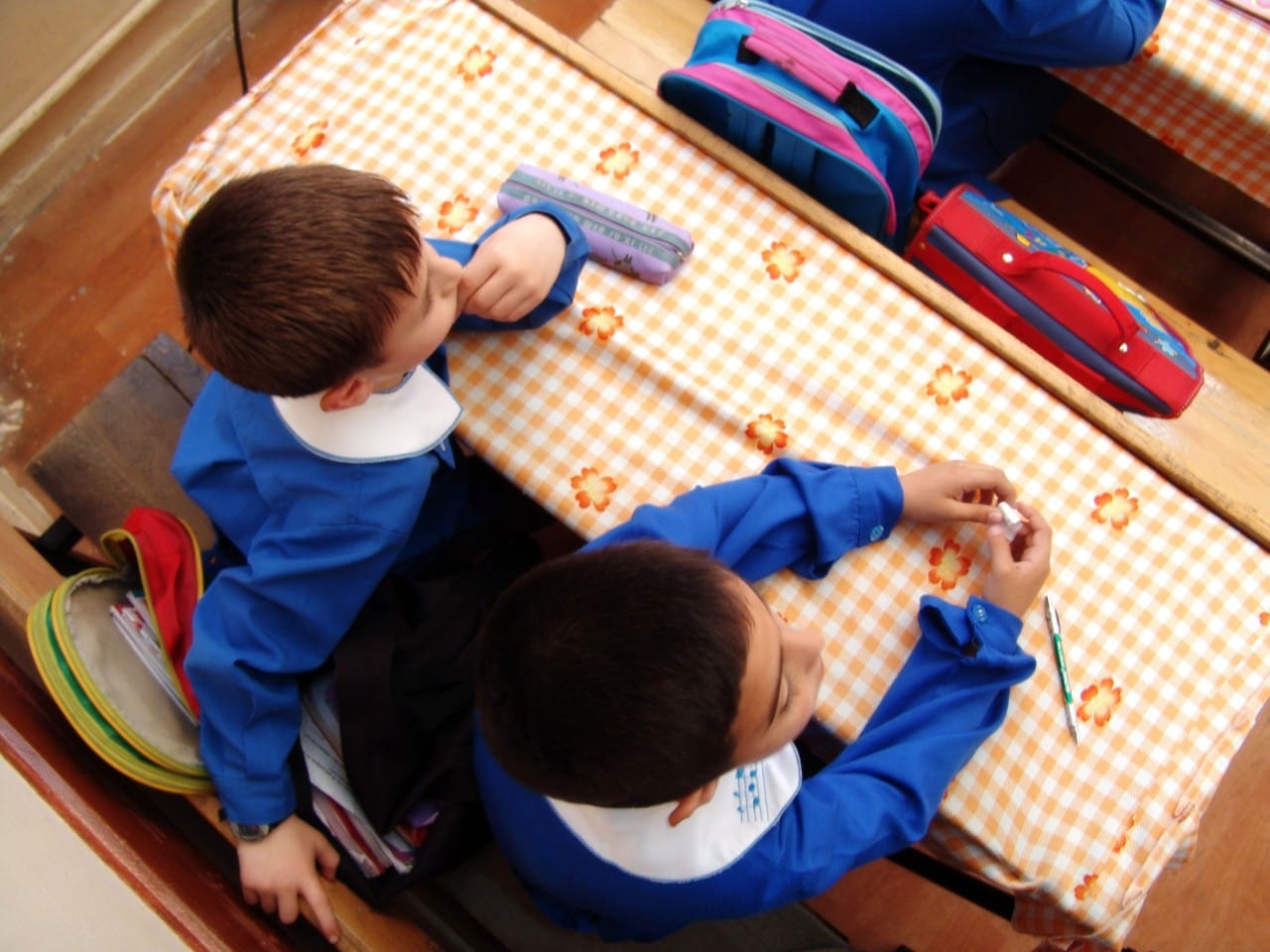 Stock image of school children in classroom.