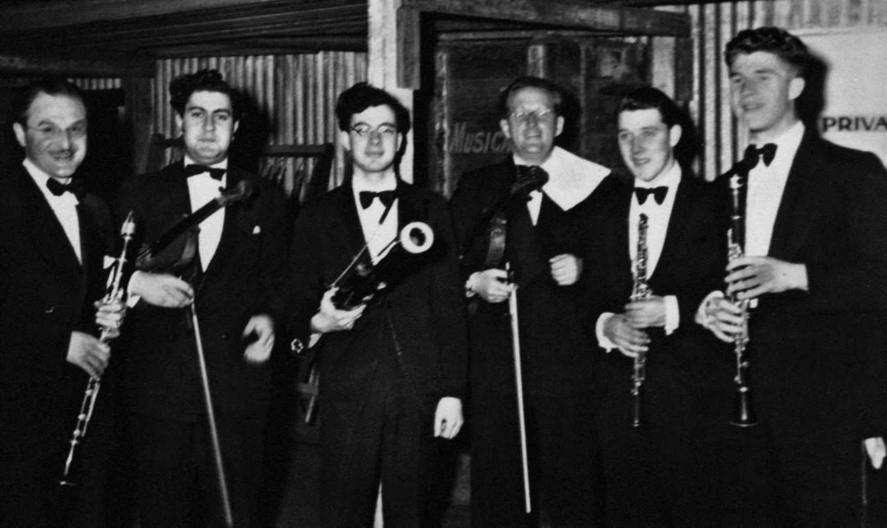 George Dreyfus, centre, holding a bassoon and Walter Wurzburger, far left, holding a clarinet. JC Williamson production 1949