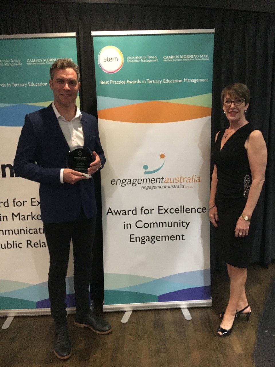 Jared Harrison and Fiona Sullivan from the Business School with the Engagement Australia Excellence in Community Engagement Award received at the 2018 Association for Tertiary Education Management best practice awards.