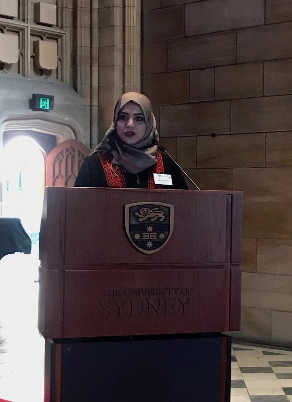 Heba al Hamarsheh speaking at the SICLE ceremony.