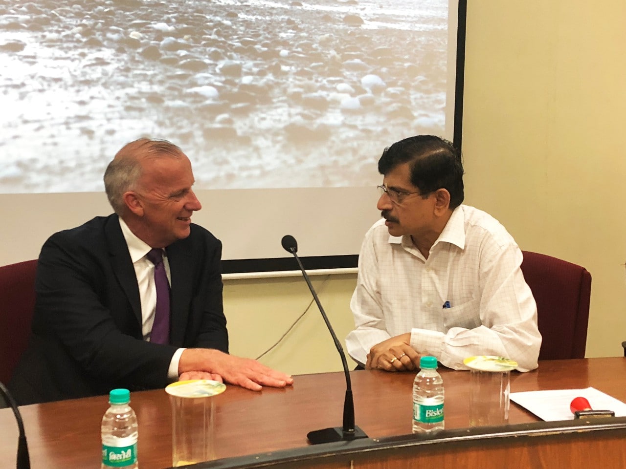 Vice-Chancellor of the University of Sydney Dr Michael Spence and Registrar of Tata Institute of Social Sciences Dr C. P. Mohan Kumar.