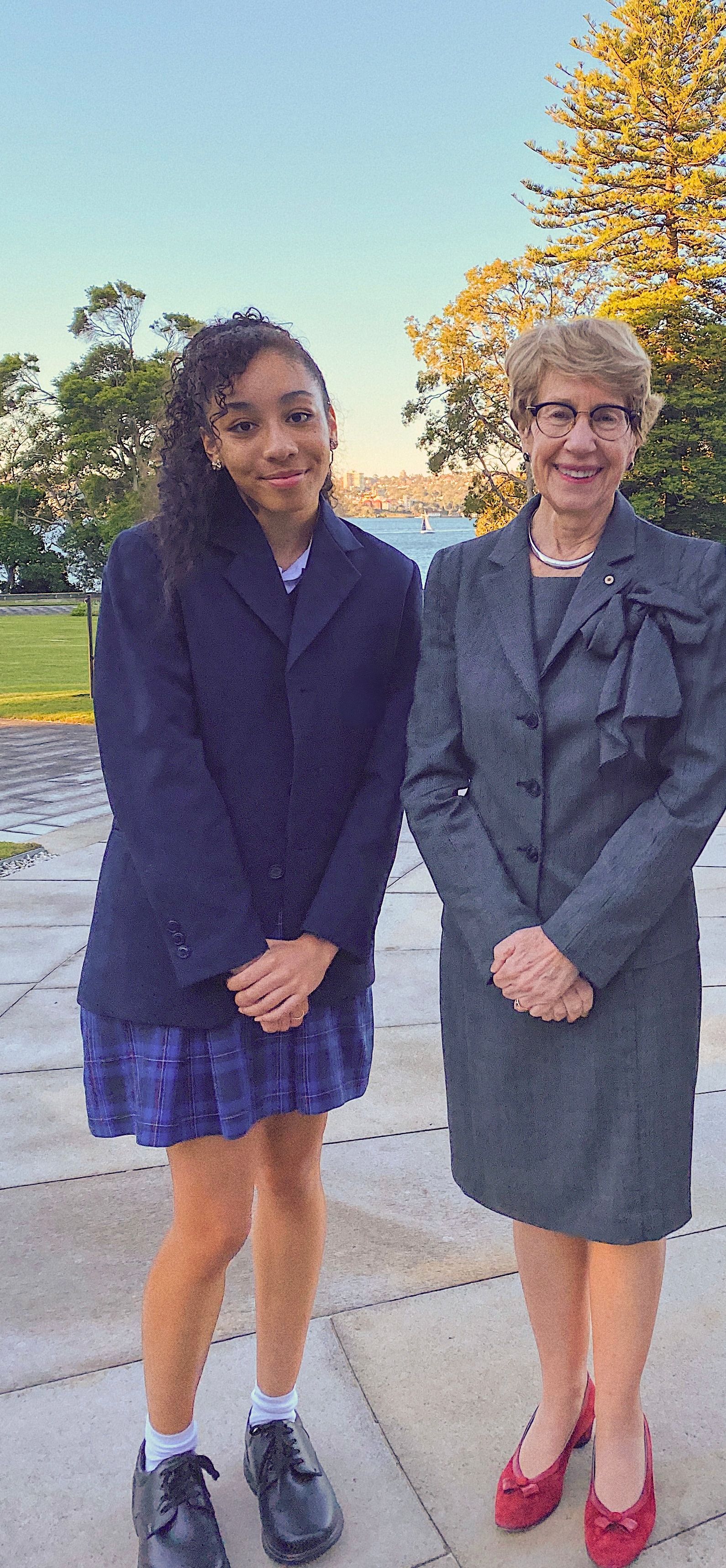 Kaela in school uniform meeting NSW Governor Margaret Beazley at a function for school captains at Government House.