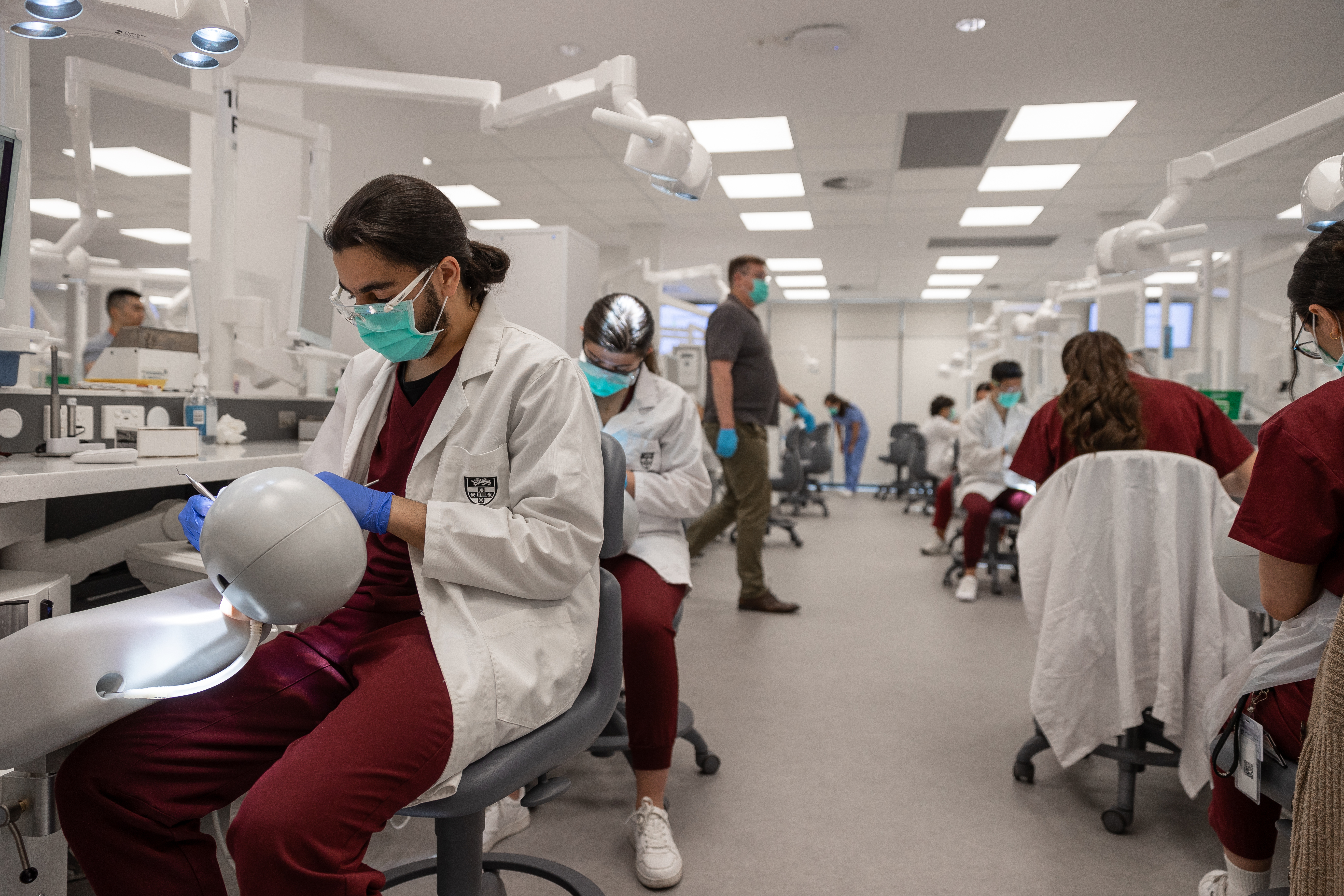 Dental students working in the simulation clinic