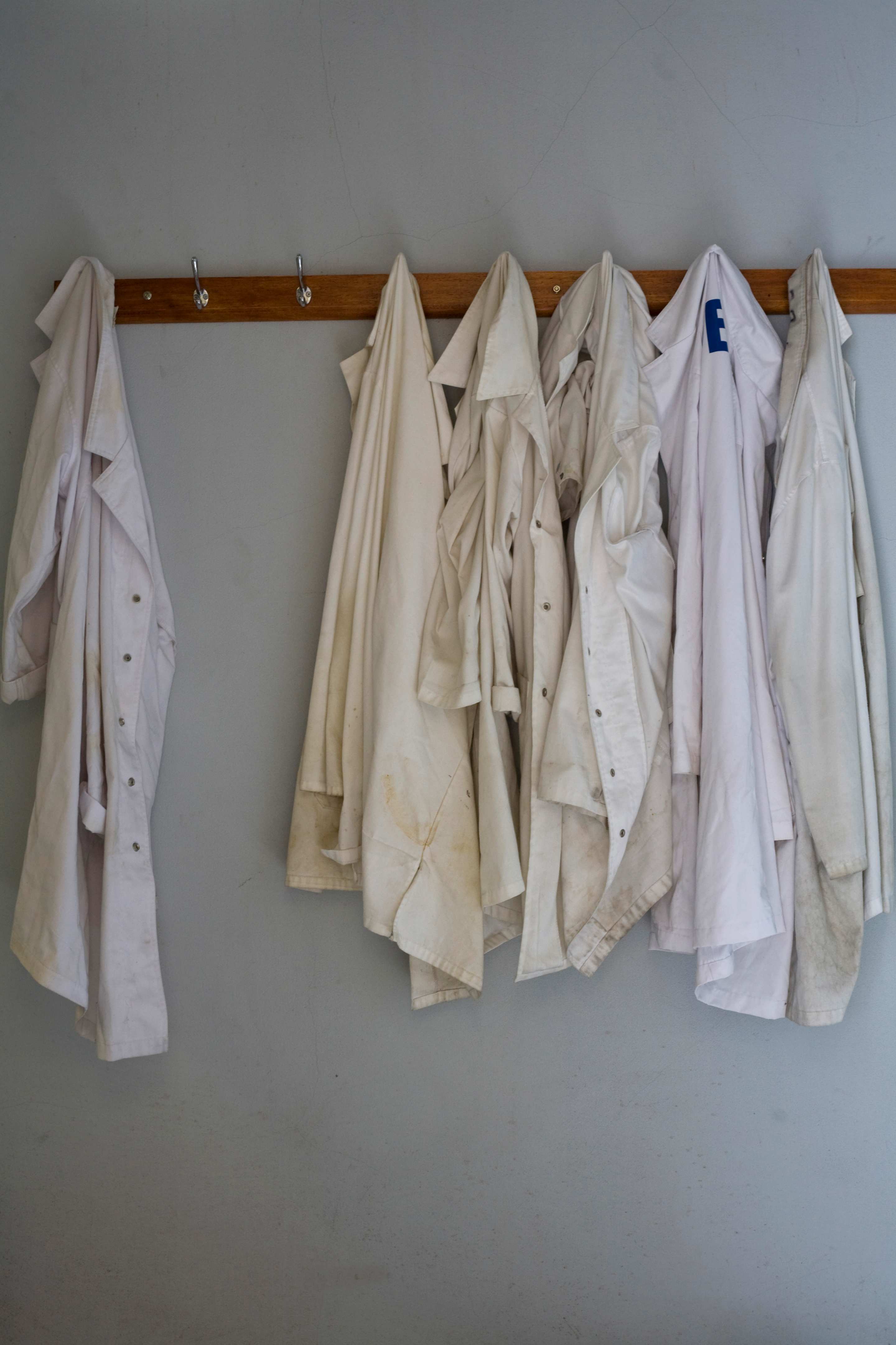 Lab coats on a hook