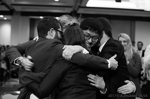 Jessup Cup team embrace