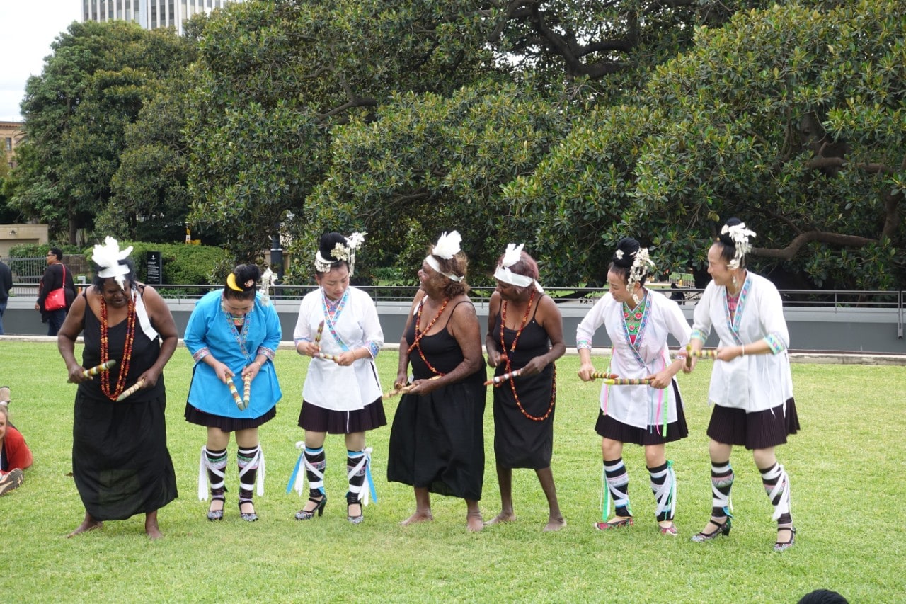 Anmatyerr women from central Australia and Kam women from south-west China exchanging culture at the Sydney Conservatorium of Music