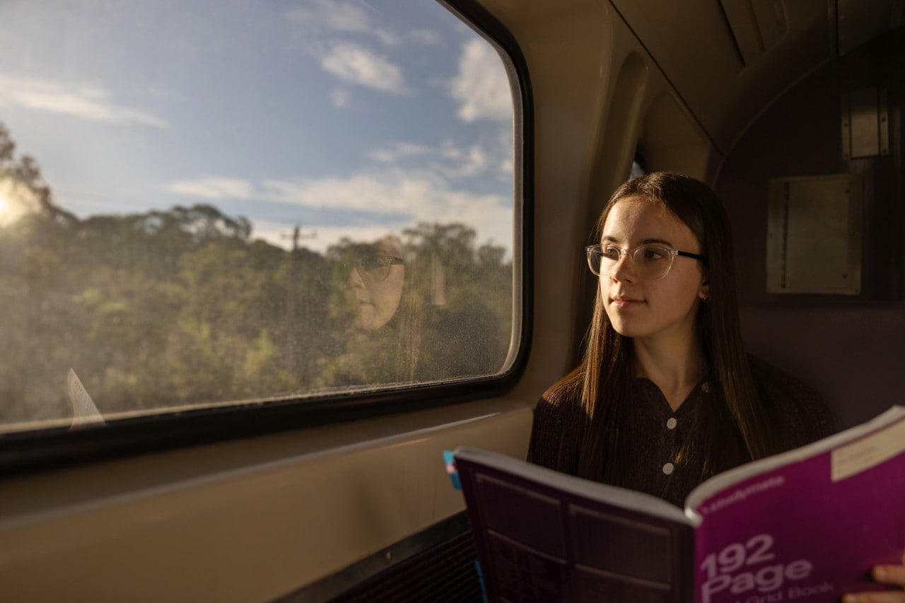 Cameryn Smider revising her notes on the train