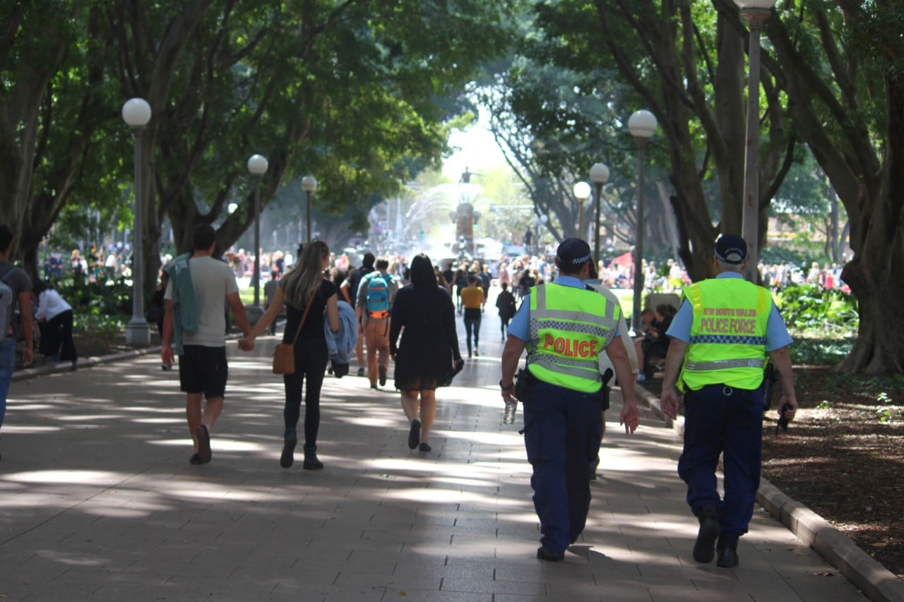 Police walking through Sydney's Hyde Park