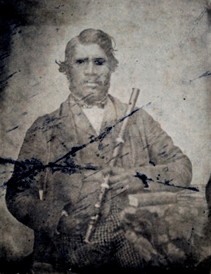 Aboriginal man with flute, Poonindie, SA. c. 1858, photograph